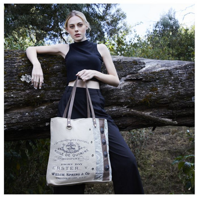 Woman with Myra Bag - Smockingbird's Unique Gifts