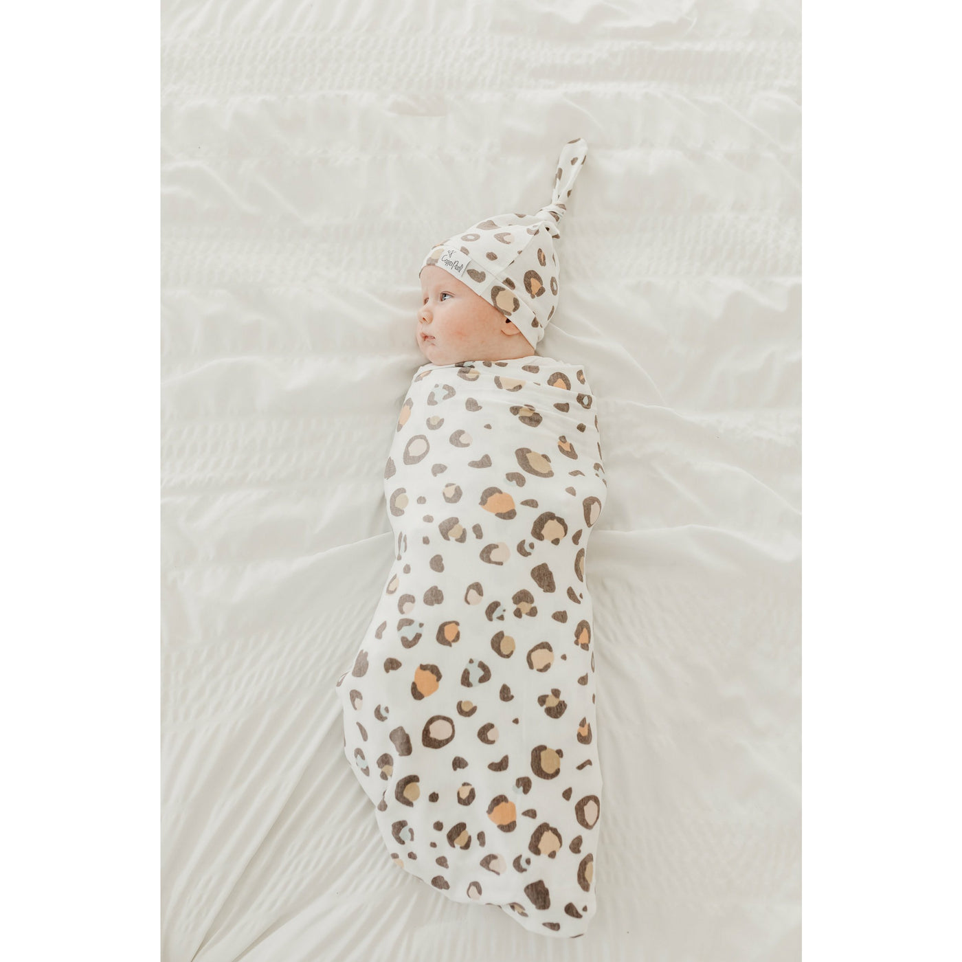 Millie Knit Swaddle Blanket on Baby - Smockingbird's